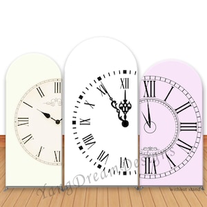 May include: Three arched panels featuring clock faces with Roman numerals. The panels are in cream, white, and light purple. The clock hands are black. The text "Yang Dream Designs" and "without stand" are visible.