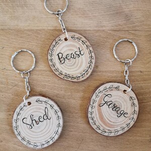 Personalised wood slice keyrings, log round keyring, calligraphy keyrings, shed garage outbuilding key chain, new home, house warming gift image 7