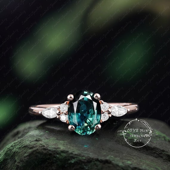 Teal green sapphire engagement ring best sale