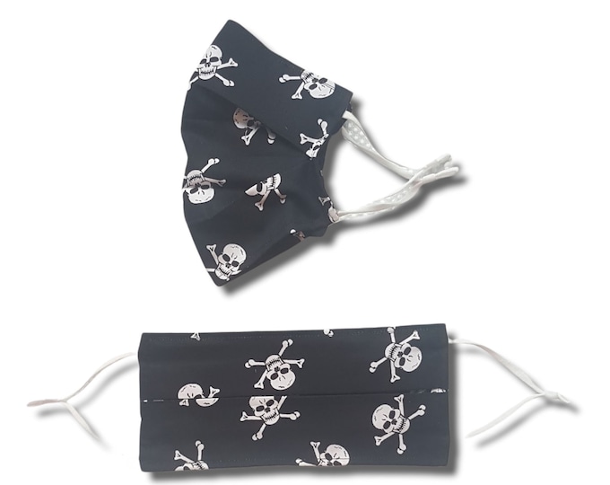Skull print face mask. Washable and reusable with filter pocket. Adjustable elastic ear loops with toggle adjustment.