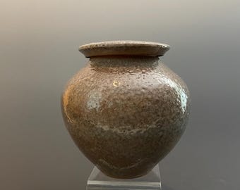 Met de hand gegooide voorraadpot