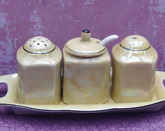 Unique vintage menage for pepper and salt as well as a mustard pot