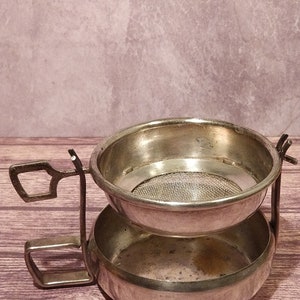 Silver-plated tea strainer