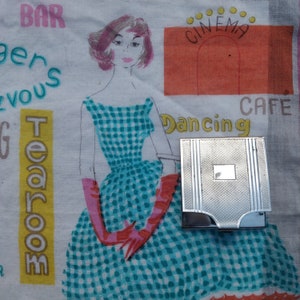Matchbook case, vintage and silver plated