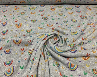 Beautiful cuddly alpine fleece in grey mottled with rainbows