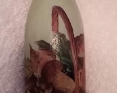 Decoupaged wine bottle