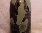 Decoupaged wine bottle