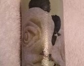 Decoupaged wine bottle