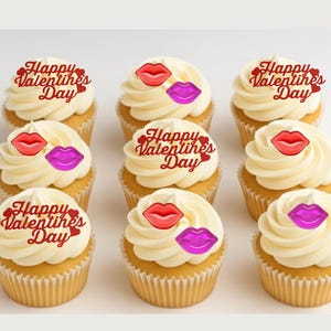 May include: Nine cupcakes with white frosting, decorated with red lips, purple lips, and "Happy Valentine's Day" text. The cupcakes are in paper liners, perfect for a Valentine's Day treat.