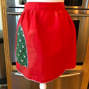 Festive Vintage Red Apron Featuring White Red and Green Christmas Tree for the Front Side Pocket and Candy Cane Striped Trim - Half Apron