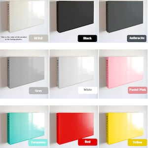 May include: A collection of rectangular metal panels in various colors, including beige, black, anthracite, gray, white, pastel pink, turquoise, red, and yellow. Each panel has a side with a series of small holes.