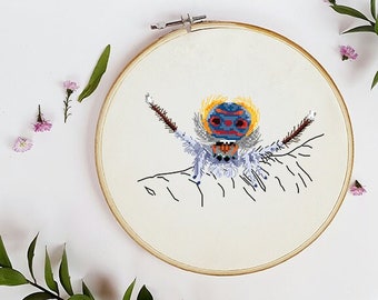 Patrón de punto de cruz de araña saltadora de pavo real