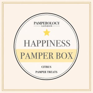 May include: A square cream-colored label with a thin gold border featuring a central circle. Inside the circle, the text reads PAMPEROLOGY LONDON, HAPPINESS PAMPER BOX, CITRUS, and PAMPER TREATS in black and gray, accented by a yellow star icon.