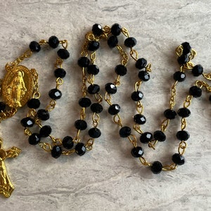 Handcrafted black and gold Catholic prayer rosary. Azabache rosary, onyx rosary, glam rosary, vintage, unisex, handmade, prayer necklace
