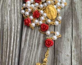 Beautiful Handcrafted Prayer Rosary. Made with red rose beads, pearls, gold crucifix and Virgin Mary medallion. Great Christmas gift!