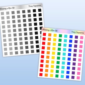 May include: Two sticker sheets with tiny squares. One sheet has a gradient of gray squares, from light to dark. The other sheet has a rainbow of colored squares. The text "Tiny Squares" and "Planning a Rosie Life" are printed on the sheets.