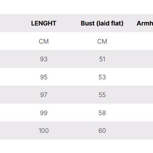 May include: Size chart showing measurements in centimeters for a garment. The chart includes sizes XS, S, M, L, and XL, with measurements for length, bust, and armhole.