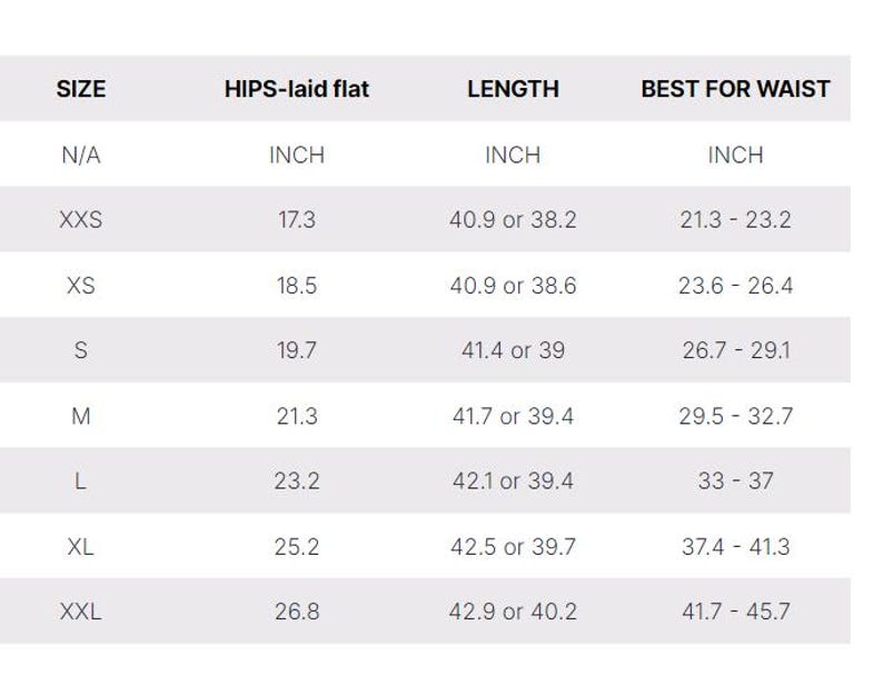 May include: A white size chart with black text. The chart includes sizes from XXS to XXL, with corresponding measurements for hips (laid flat) in inches, length in inches, and best waist size in inches. The chart is on a white background.