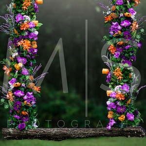 May include: A rustic wooden swing decorated with purple, orange, and white flowers. The swing is hanging from two ropes and is set against a blurred green background.