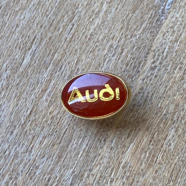 Small Glossy Enameled Bronze Embossed Audi Lapel Pin - Classic Automotive Charm
