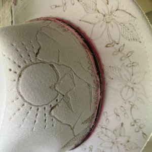 White fedora hat mountain design
