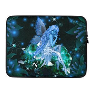 May include: A blue fairy with wings sits on a large green crystal. The fairy has long blue hair and is wearing a white dress. The background is black with green and blue floral designs and glowing lights.