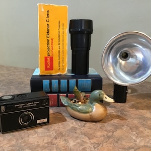 Imperial Instant Load 900 Camera, 126 cartridge Kodak Kodalite Flasholder  Lumaclad Reflector, Kodak Ektanar C Projection Lens Zoom Carousel