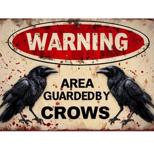 May include: A rectangular metal sign with a distressed, aged appearance. The sign features a red oval with the word "WARNING" in white. Below, two black crows flank the text "AREA GUARDED BY CROWS".
