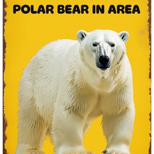 May include: A yellow metal sign with the text "WARNING: POLAR BEAR IN AREA" in black. A large, white polar bear is centered on the sign. The sign has a rusty brown border.