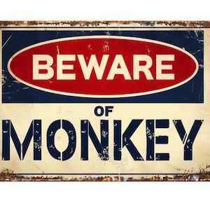 May include: A vintage-style metal sign with a distressed, rusty look. It features a red oval with the word "BEWARE" in white lettering. Below the oval, it reads "OF MONKEY" in blue lettering.
