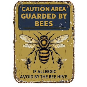 May include: A rectangular metal sign with a distressed finish. The sign features a large bee illustration and the text "CAUTION AREA GUARDED BY BEES" in navy blue. Below the bee, it reads "IF ALLERGIC AVOID BY THE BEE HIVE."