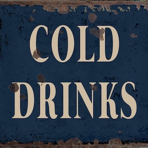 May include: A vintage-style metal sign with a blue background and white text that reads "COLD DRINKS". The sign has a distressed, rusty look.