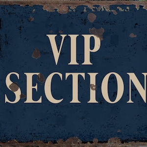 May include: A blue metal sign with white lettering that reads "VIP SECTION". The sign has a distressed, rusty look.