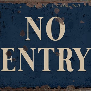 May include: A blue metal sign with a rusty border and white text that reads "NO ENTRY".
