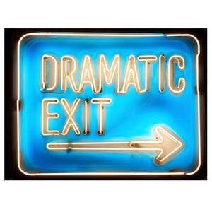 May include: A neon sign with the words "DRAMATIC EXIT" in white, with an arrow pointing right. The sign has a blue background and a black border.
