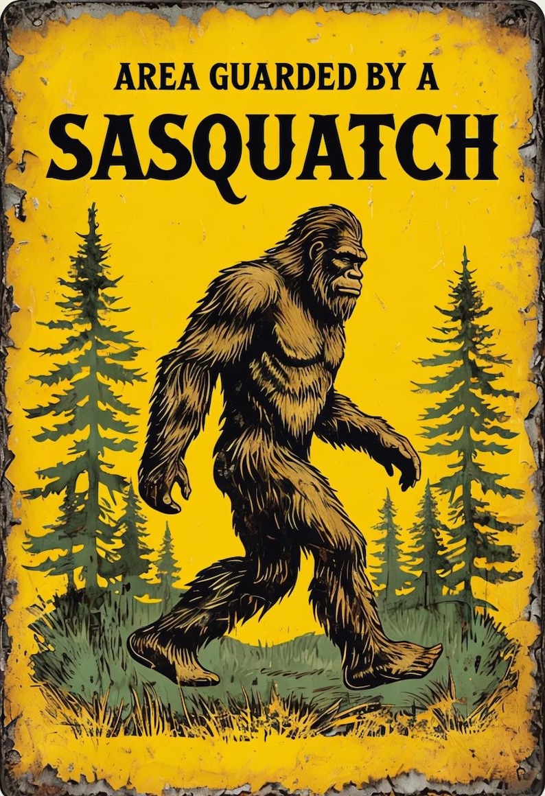 May include: A vintage-style metal sign with a yellow background and a distressed look. The sign features a brown Sasquatch illustration walking through a forest scene with green trees and grass. The text "AREA GUARDED BY A SASQUATCH" is at the top.