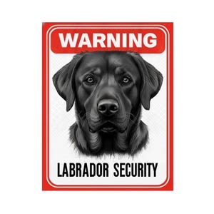May include: A rectangular sign with a white background and a red border. The top features the word WARNING in white text on a red bar. The center displays a detailed illustration of a black Labrador dog head. The bottom reads LABRADOR SECURITY.