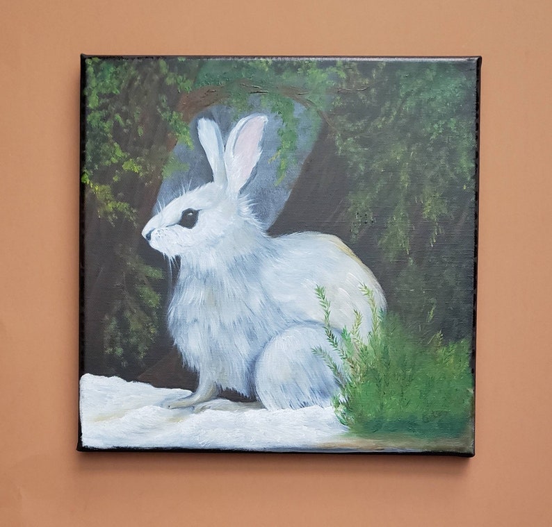 Hand painted oil winter scene of snowshoe rabbit