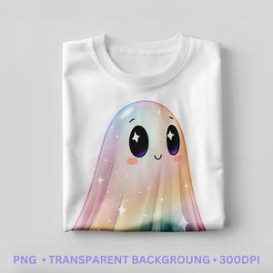 May include: White t-shirt featuring a colorful ghost design. The ghost has large, dark eyes, rosy cheeks, and a smiling mouth. The ghost is a blend of pastel colors with sparkling stars. The text at the bottom reads "PNG • TRANSPARENT BACKGROUNG • 300DPI".