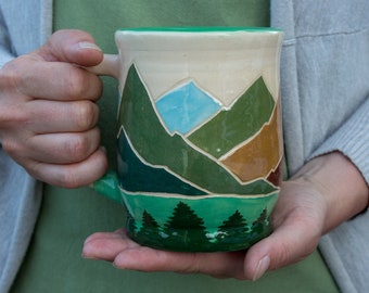 Handcrafted Ceramic Mug: Sgraffito Mountain & Forest Illustration