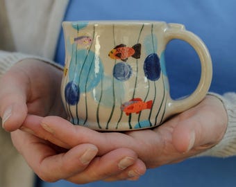 Pottery Ceramic much 7 oz with Fish Illustration