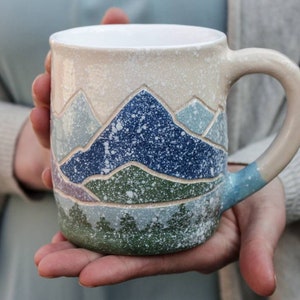 Ceramic mug 12 oz, 16oz handcrafted teacup with winter mountains and forest  illustration,  eco-friendly gift, pottery white snowfall  mug