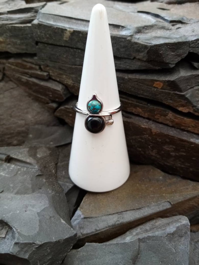 An Adjustable 925 Sterling Silver Mohave Copper Turquoise and Whitby