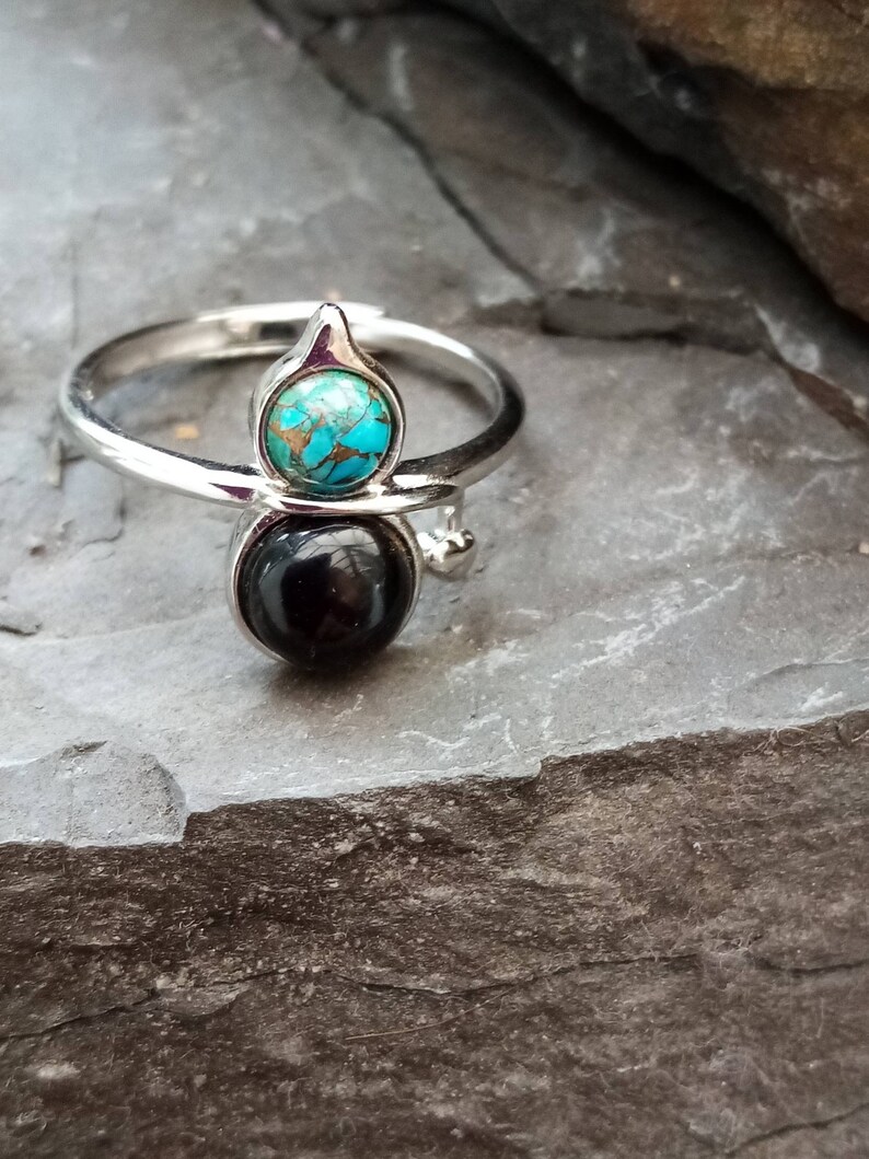 An Adjustable 925 Sterling Silver Mohave Copper Turquoise and Whitby