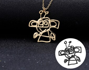 child drawing jewellery