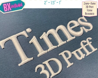 May include: White embroidered text "Times 3D Puff" on a blue fabric background. The text is 2 inches, 1.5 inches, and 1 inch tall. 2mm-4mm 3D puff foam is required for this embroidery design.