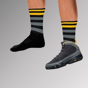 Jordan 9 negro con amarillo sales