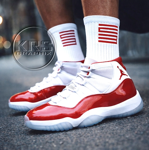 jordan 11 cherry low on feet