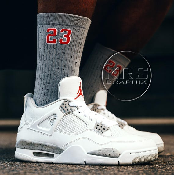 white oreo 4s on foot