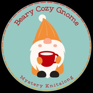 May include: A circular graphic featuring a gnome holding a red mug. The gnome has an orange hat and arms, a white beard, and black shoes. The text "Beary Cozy Gnome" and "Mystery Knitalong" are in red around the gnome.